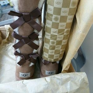 Ugg  tall light brown with Bailey bow